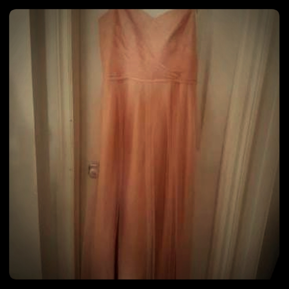 Evening dress with flowers on the shoulder straps